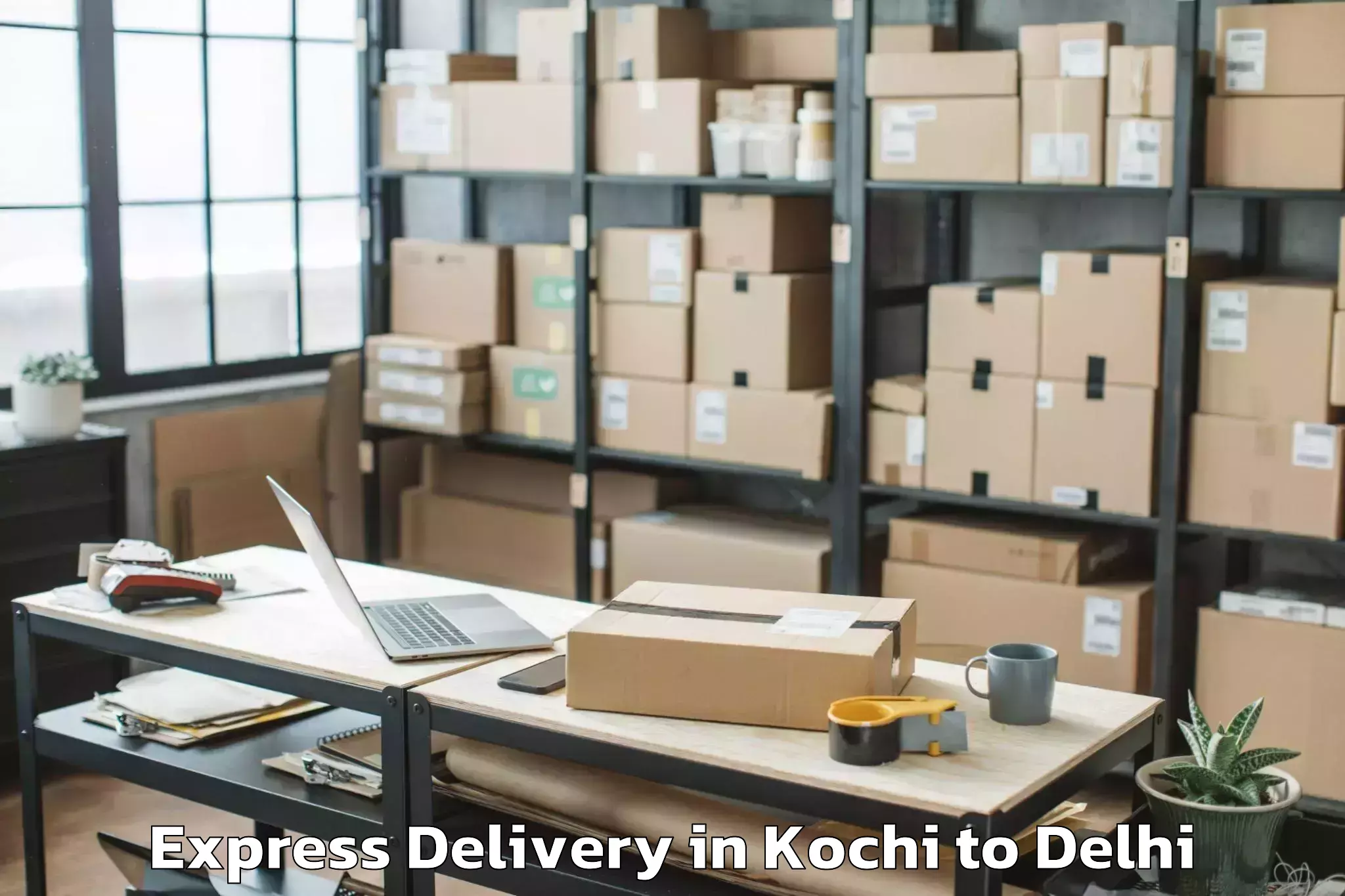 Book Kochi to Defence Colony Express Delivery Online